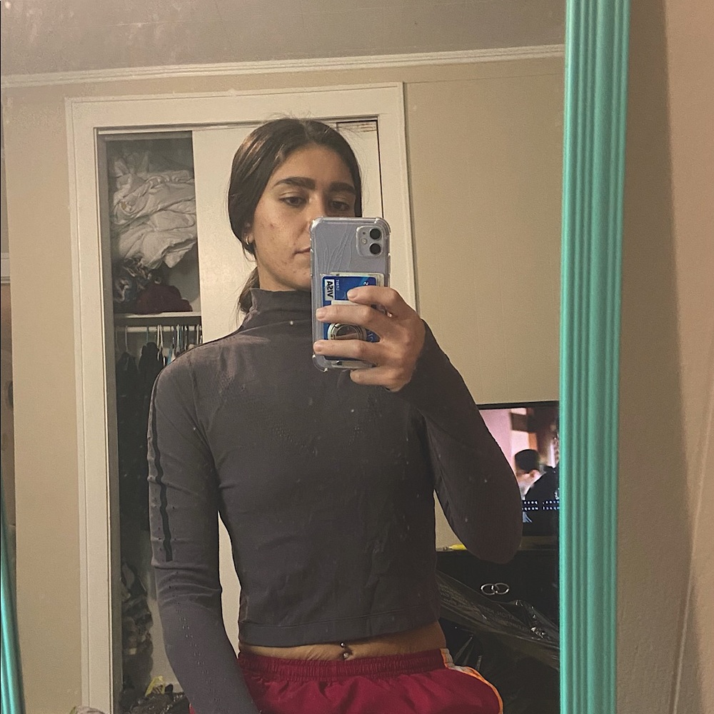 Fabletics mock neck cropped seamless cutout long sleeve. Size M